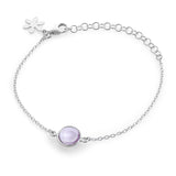 Armlenkje med rund cabochon, 1574