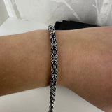 KONGE, oksidert armlenkje, 1 mm tråd