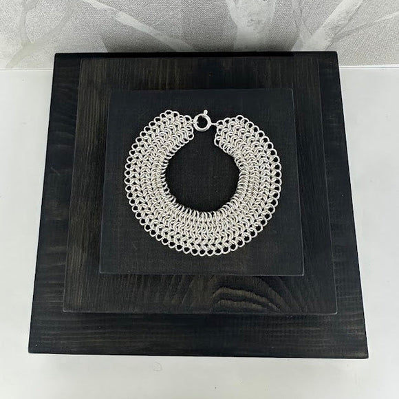 Handlaga armlenkjer (ringteknikk)