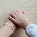 Armlenkje med emaljehjerter - rosa