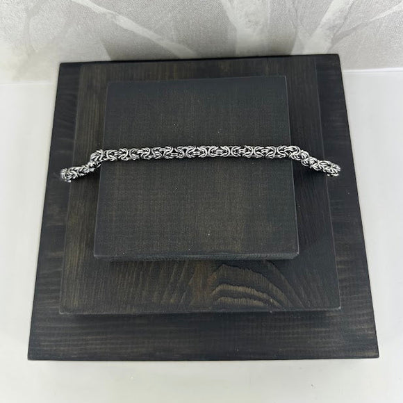 KONGE, oksidert armlenkje, 1 mm tråd