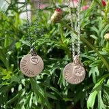 1,5 cm amulett med miniknott