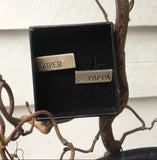 Mansjettknappar med diverse tekstar