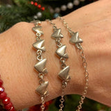 Lite Eidahjarte, armlenke med eit eller fleire hjarter