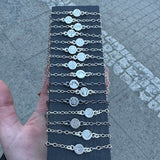 Knott, armlenke med symbol