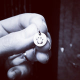 1 cm amulett med stjerneteikn