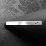 Slipsnål med stjerneteikn-symbol